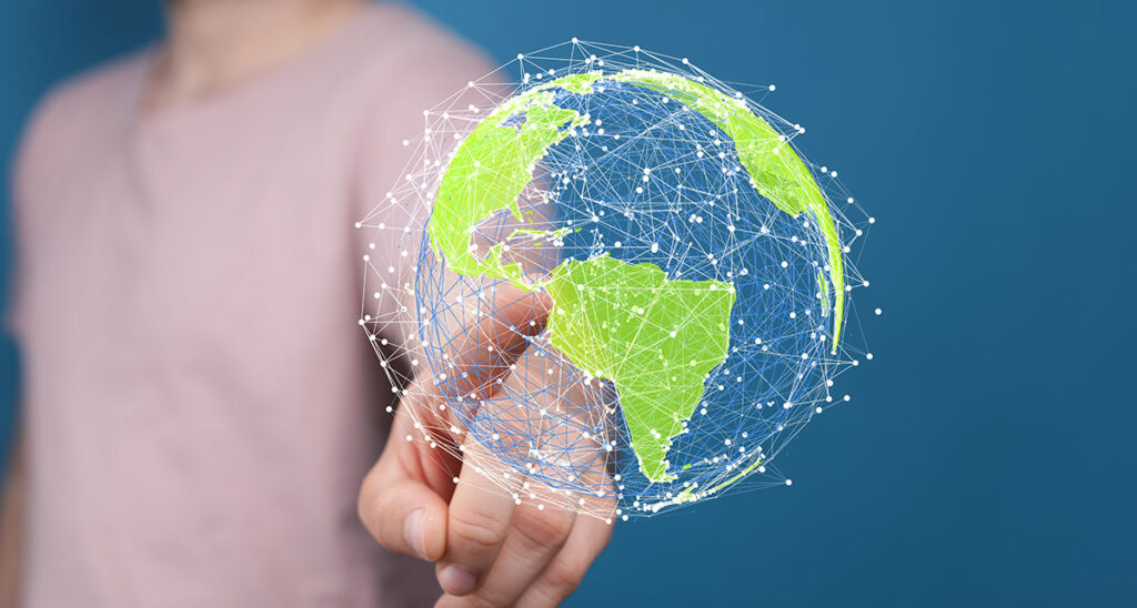 woman pointing at globe
